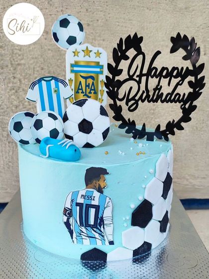 Kicking off a birthday celebration with a Messi and Argentina-themed football cake. This design uses edible prints and fondant details to create a dynamic tribute to the football legend.