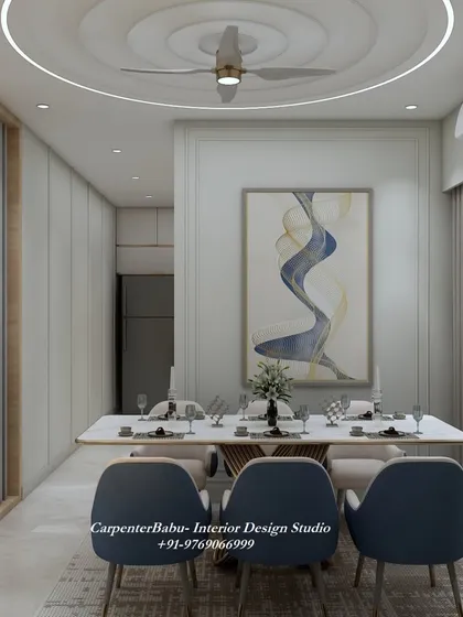 This dining area is clean and minimalist, with a large abstract painting as the main focal point. The design proves that sometimes, less is more.