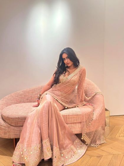 The full view of the pink sharara set, a modern and comfortable yet incredibly stylish choice for a wedding function.