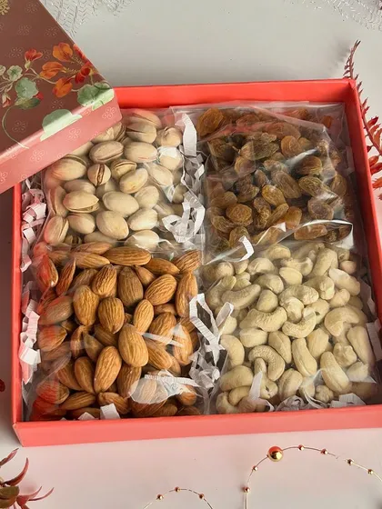 This Diwali Fruit & Nut Box is a healthy and traditional gift, filled with premium quality pistachios, raisins, almonds, and cashews in a beautifully designed box.