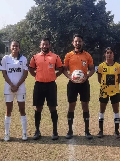 The captains of Noida City FC and Goodwill FC with the match officials, ready to kick off their game in the Women's Championship.