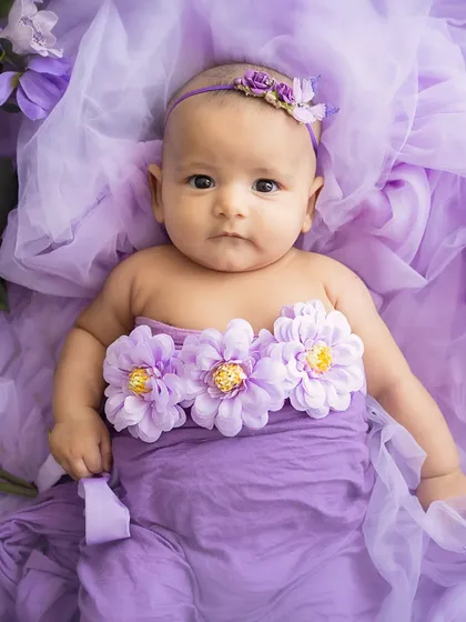 A calm and curious gaze. This 3-month-old was so alert and engaged during her beautiful lavender-themed session.