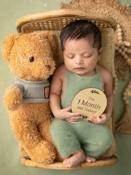 A calm and peaceful soul. This one-month-old melted our hearts with his sweet, sleepy expressions. It was pure joy to capture these quiet moments.
