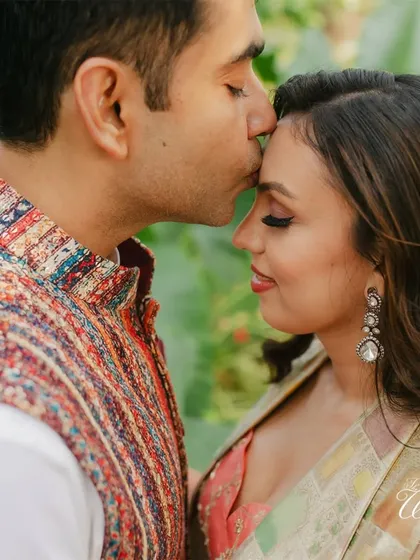 A close-up of a tender moment during the Haldi ceremony. My goal is to create an environment where couples feel relaxed enough to share these genuine expressions of affection.