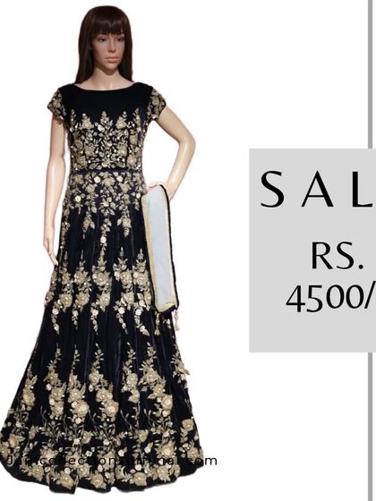 This black and gold embroidered gown is a glamorous choice for any party, and it's on sale for Rs. 4500.