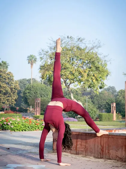 A beautiful expression of flexibility in this standing split variation, performed outdoors.