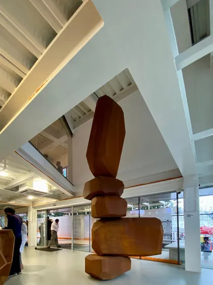 Art is not an afterthought; it is integral to the architectural experience. This sculpture by Arik Levy, standing in the atrium of the MAP museum, is a focal point that engages visitors and creates a dynamic dialogue with the surrounding space.