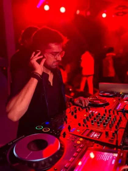 A close-up shot from a gig in Turkey, focused on the music under the red lights. The atmosphere in the club was intense.