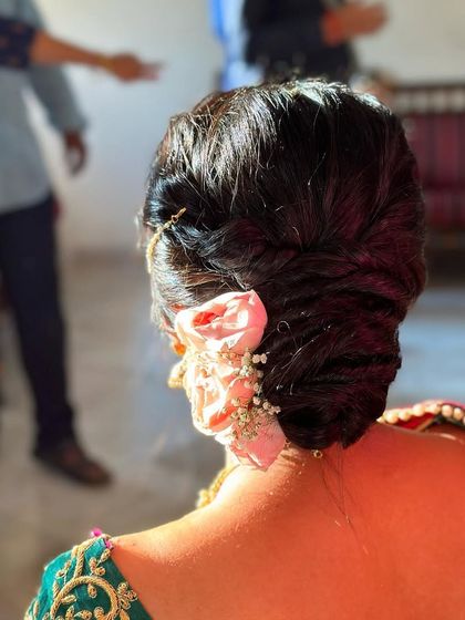 Elegant Bridal Buns & Updos photo 17