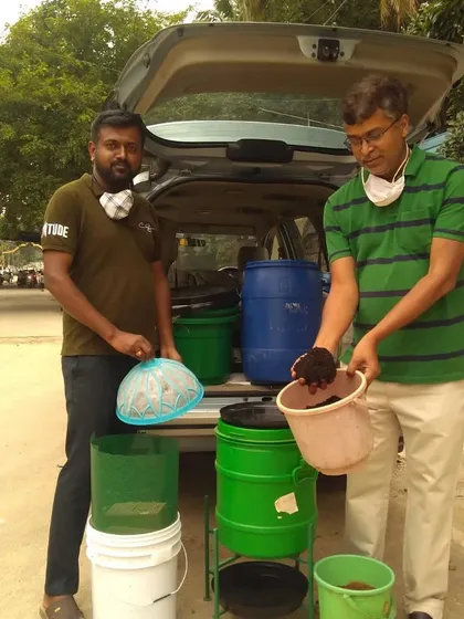 Our composting specialists showing off their work. Sustainability is woven into every aspect of our space, from waste management to urban farming.
