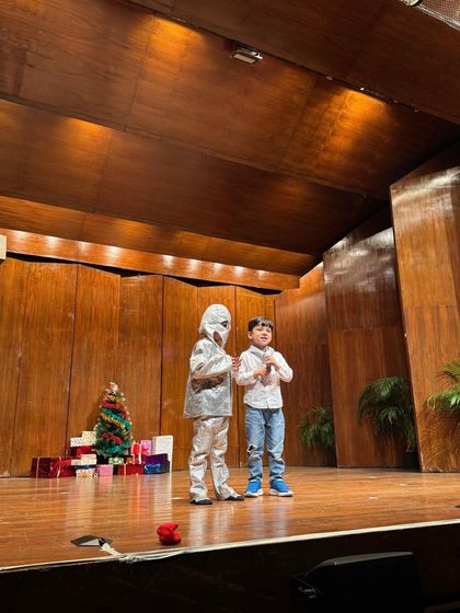 A mummy and his friend on stage, a scene from one of our imaginative and fun-filled skits.