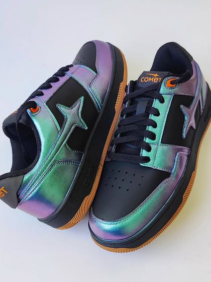 Another view of the custom Comet sneakers. The contrast between the black base and the iridescent panels is what makes this design so striking.