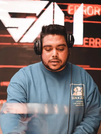 A focused look while at the decks. Minding my business means delivering the best possible musical experience.