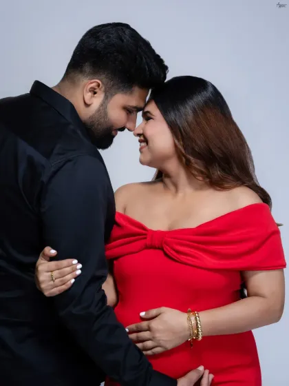 An intimate close-up where the world fades away. In the studio, I can create a space where couples can just be themselves, resulting in genuine moments of connection like this one between Manoj and Ruchika.