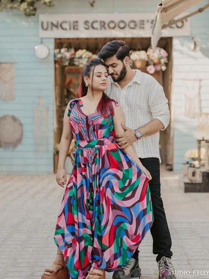 A vibrant and colorful pre-wedding look. The makeup is kept fresh and clean to balance the bold, multi-colored outfit, with a focus on flawless skin.