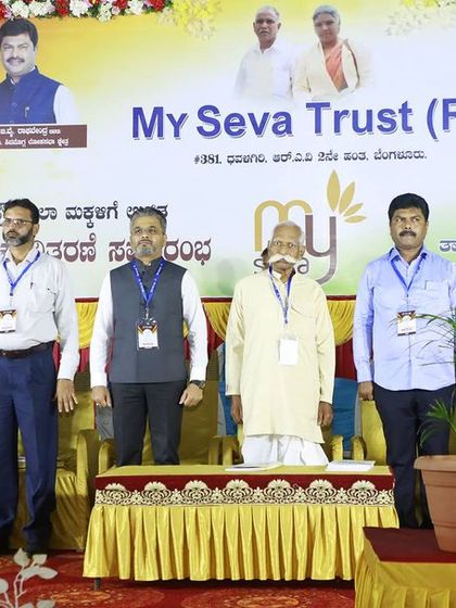 The dignitaries on stage at the MY SEVA TRUST event, united in our mission to support education for all.