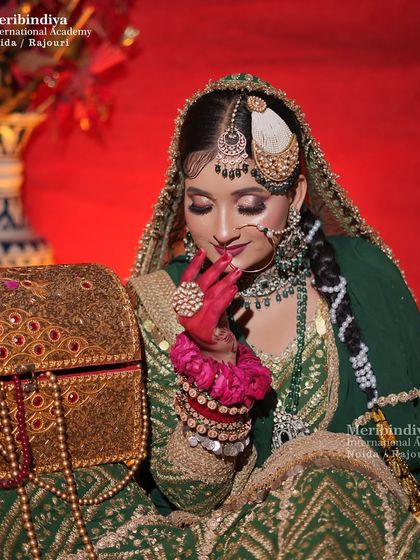 This shot focuses on the bride's expression and the detailed makeup on her eyes and lips.