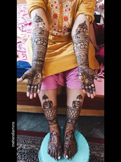 A complete bridal mehandi set, covering both hands and feet with incredible detail. Our advanced course covers these extensive designs, including traditional doli and architectural motifs, preparing you for high value bridal projects.