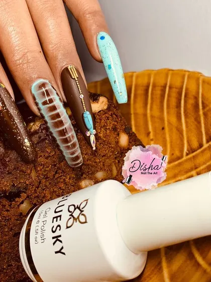 A delicious-looking set inspired by chocolate cake, with brown polish, textured details, and turquoise accents.