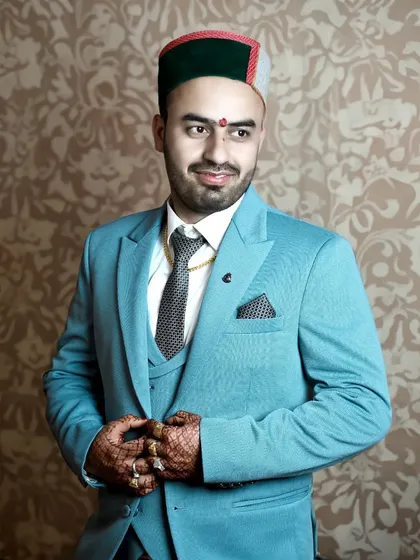 A relaxed and happy groom portrait. The soft smile and natural pose make this photo feel warm and genuine.