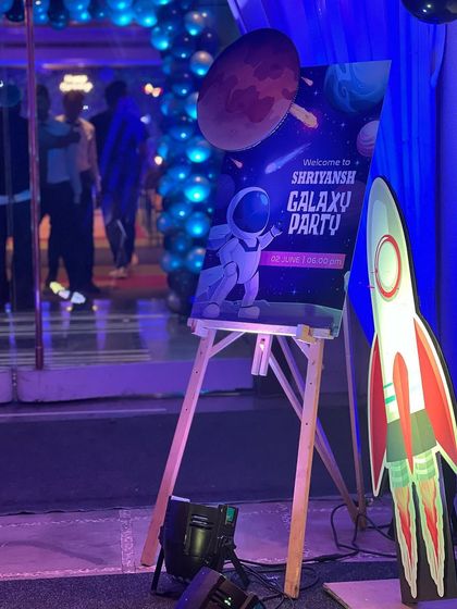 The journey begins at the entrance with this "Galaxy Party" welcome sign for Shriyansh, setting the stage for an interstellar adventure.