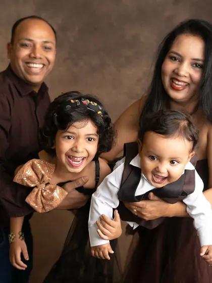 A family portrait bursting with joy and energy. I love capturing the playful, candid moments that show a family's true personality.