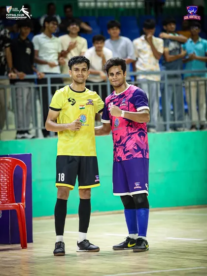 Two players posing for a photo after the semi-final win.