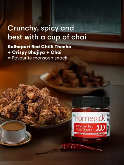 The perfect monsoon snack: crispy bhajiyas, a hot cup of chai, and a dollop of our crunchy, spicy Kolhapuri Red Chilli Thecha. It's a combination that defines rainy day comfort.