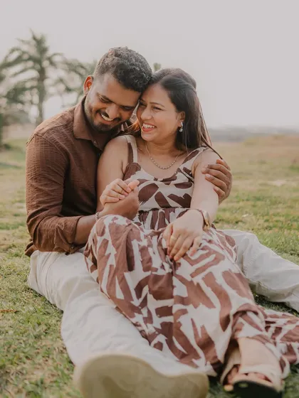 Pure, uninhibited laughter during a pre-wedding shoot in an open field. Capturing these moments of genuine happiness is what makes my job so rewarding.