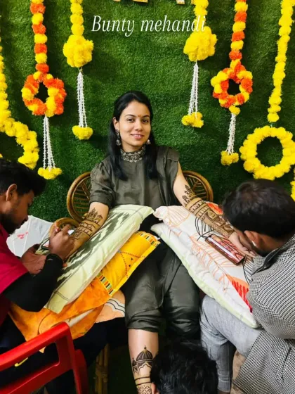 A bride enjoying a comfortable mehendi session with me and my team. We make sure the long hours are a pleasant experience.