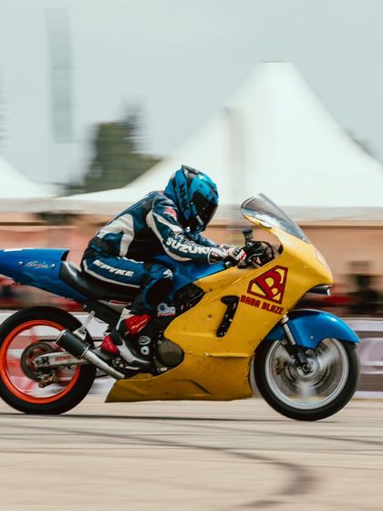 A custom-built drag bike with a Superman theme shows the personality and creativity of the Indian drag racing community.