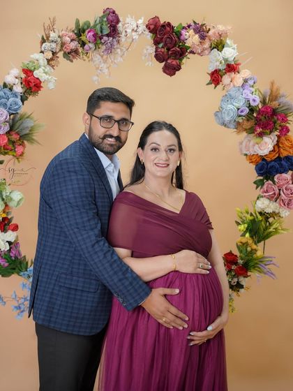 A warm and loving embrace. This close-up couple's portrait beautifully captures the joy and intimacy of this special time.
