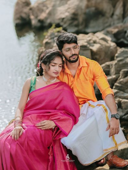 A quiet, tender moment of rest. The soft light and serene setting make this a very romantic and peaceful image.