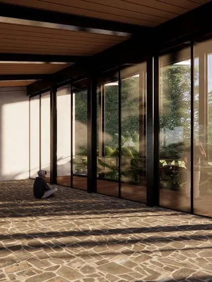 The interior render of the multipurpose hall, envisioned as a space for yoga and meditation. The natural stone floor and expansive glass walls create a serene environment where sunlight and shadows become part of the experience.