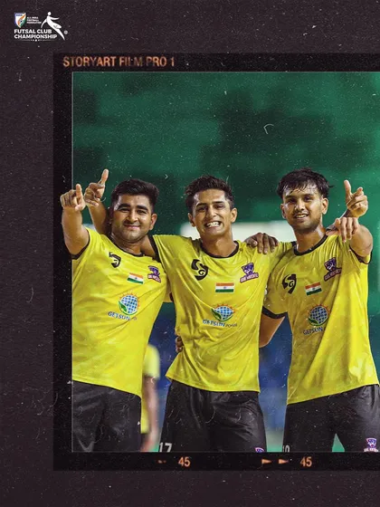 Three players celebrating a goal together, showcasing our team unity.
