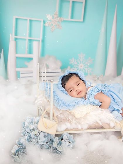 Another beautiful angle of our winter wonderland theme. The soft lighting and cool tones make for stunningly peaceful newborn portraits.