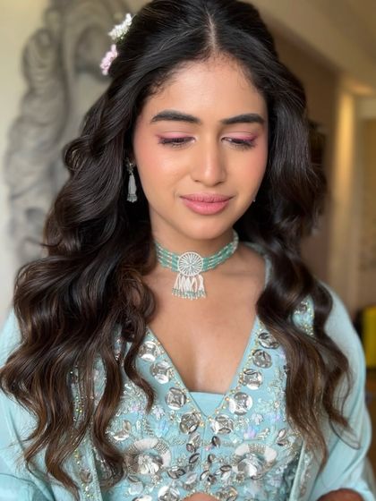 A close-up of the soft pink eye makeup and glowing skin, perfect for a daytime Haldi event.