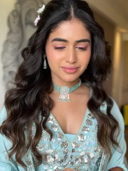 A close-up of the soft pink eye makeup and glowing skin, perfect for a daytime Haldi event.