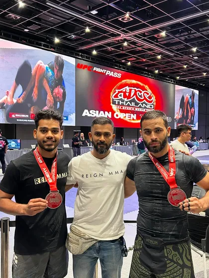 I am incredibly proud of the grit my team shows at every tournament. Here I am with two of my students after they each won a silver medal at the prestigious ADCC Asian Open in Thailand. This is a testament to our dedicated training camps and our focus on peaking at the right time for competition.