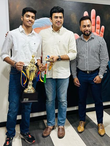 A duplicate image of Akash K J and MP Tejasvi Surya, emphasizing the recognition of his sporting excellence.