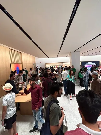 The scene inside the Apple Delhi store on inauguration day, packed with customers. Seeing the space come alive is the final reward after months of intense construction and meticulous planning.