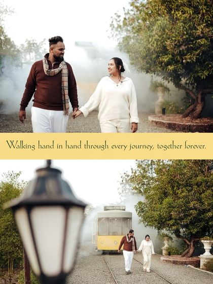 A romantic shot of the couple walking hand-in-hand along the tracks, with the vintage train car in the background. The smoky atmosphere adds a dreamy, cinematic quality to this creative pre-wedding shoot.