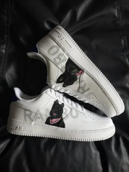 A top-down view of the Rambo custom sneakers.