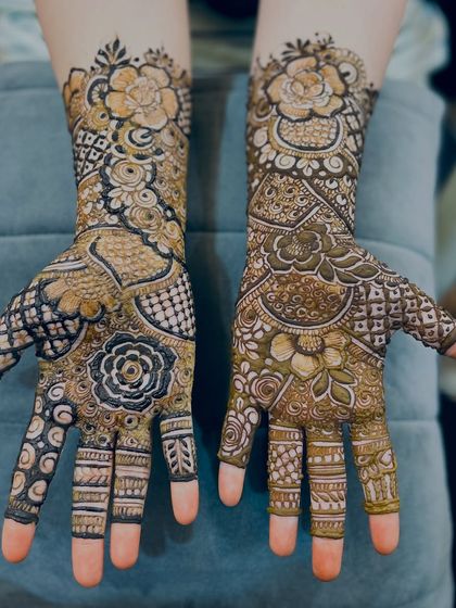 Another angle of this lovely non-bridal design, showing the detailed work on the fingers and palms.