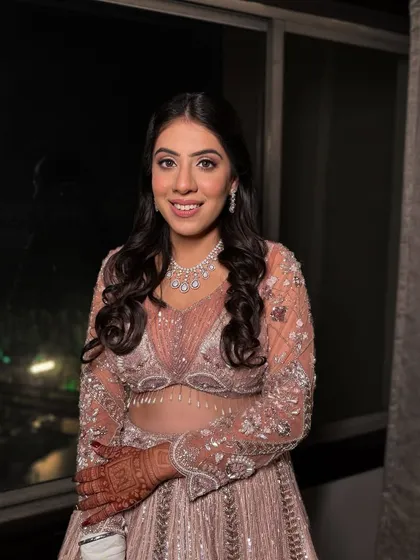 Ready to step into her forever story. Ankita's happy smile shows how confident and beautiful she felt in her chic and glamorous engagement makeup.