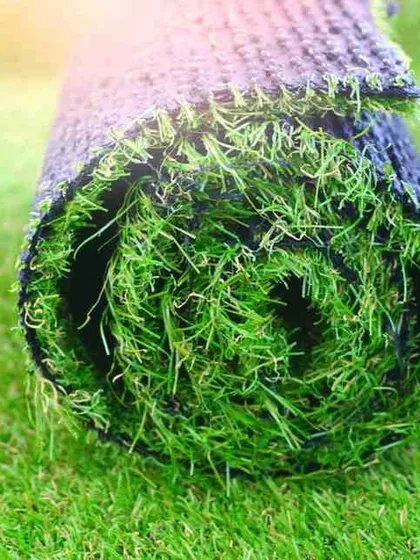 This is a close look at the high-quality artificial turf I use before it's installed. The dense fibers and durable backing are designed to be UV-resistant and weatherproof, ensuring a long-lasting, vibrant green lawn for your space.