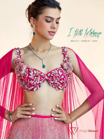 This look for a designer shoot features soft, romantic makeup with a focus on flawless skin and subtly defined eyes. Paired with a delicate updo, it enhances the intricate floral details of the garment without overpowering it.