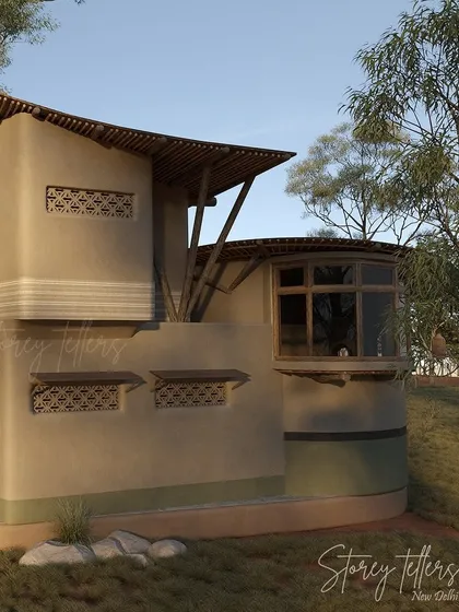 The exterior of a guest unit featuring a bay window and decorative jali screens. The walls are finished with natural plaster in earthy tones, helping the building blend seamlessly into the landscape.