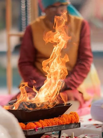 A close up of the sacred fire (Agni), the divine witness to the marriage vows in a Hindu wedding.