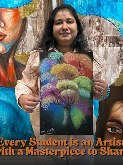 I believe every student is an artist with a masterpiece to share. This student is proudly displaying her vibrant, textured tree painting, a testament to her unique creative expression.